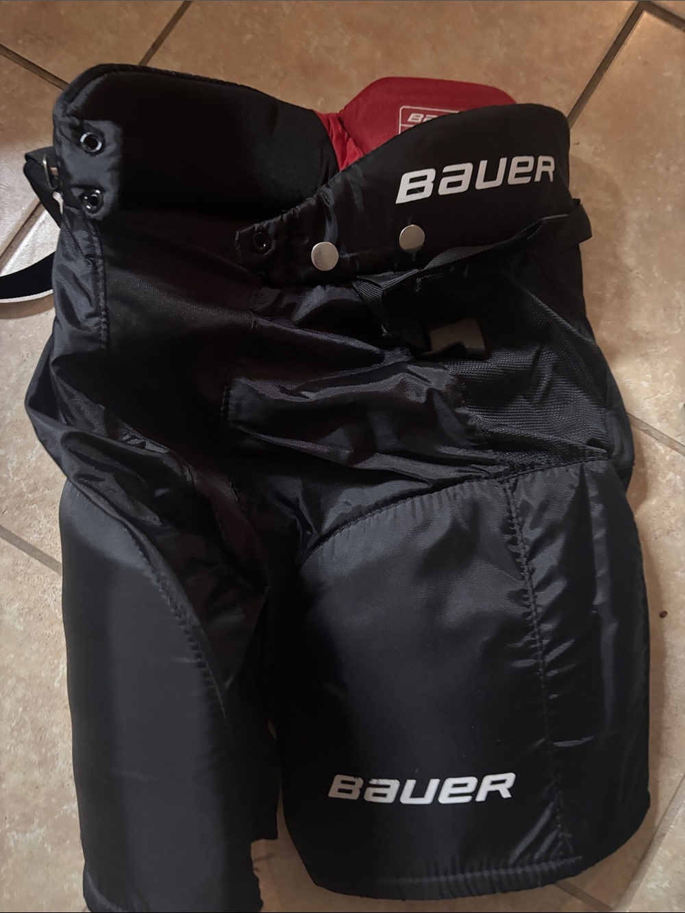 Bauer Black Hockey Pants with Red Liner Accent